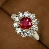 Platinum and 18K ring with 1.70 Ct. round Ruby