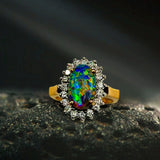 18K Gold and Platinum Ring With an Australian Opal and Natural White Diamonds