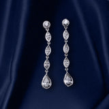 18K white gold bezel set dangle diamond earrings