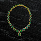 18K yellow gold necklace with pear shape emeralds and diamonds