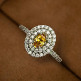 18K gold ring with modified natural, vivid orange-yellow diamond