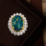 Custom platinum and 18K gold ring with Australian black opal